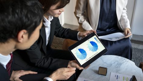 business-people-working-with-ipad-side-view